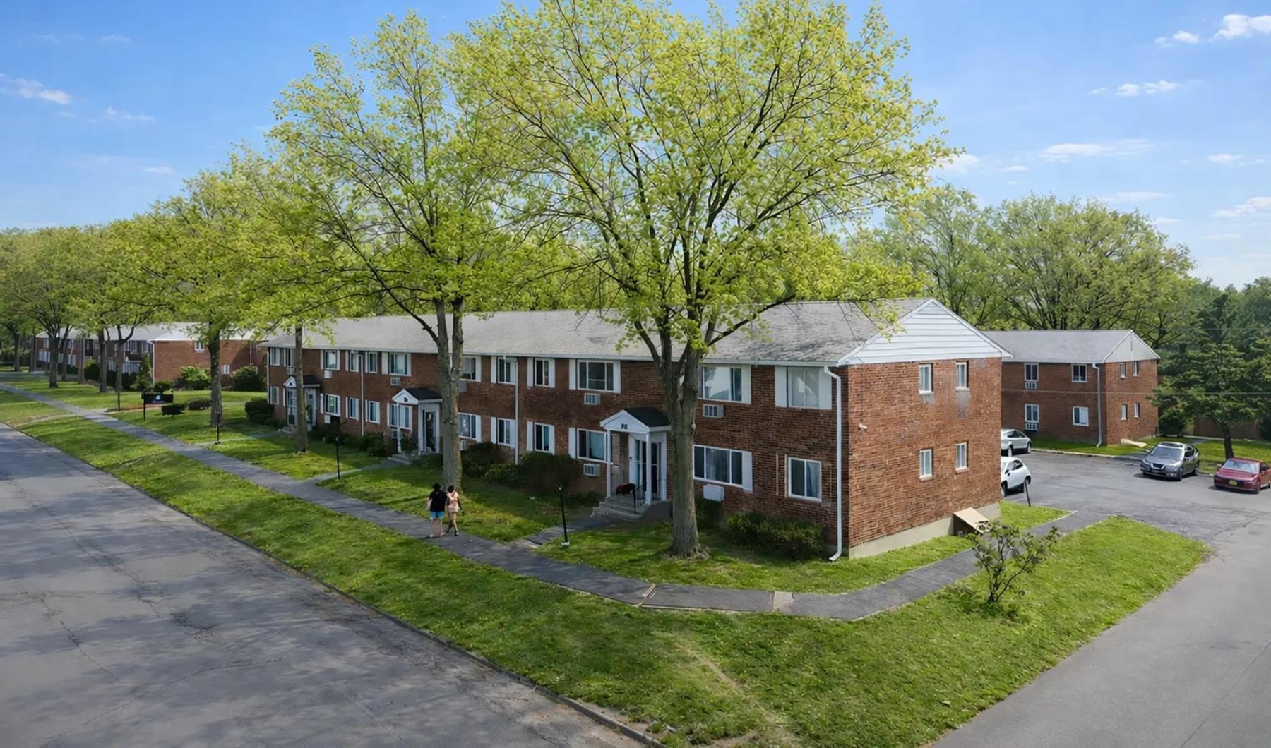 a street with trees and buildings